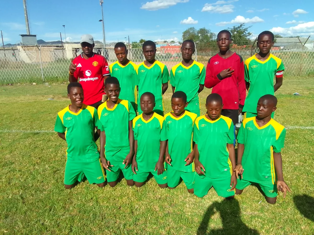 Magic Boys FC green squad with their coaches