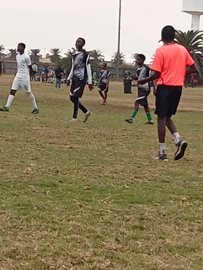 Magic Boys FC players training on a community field