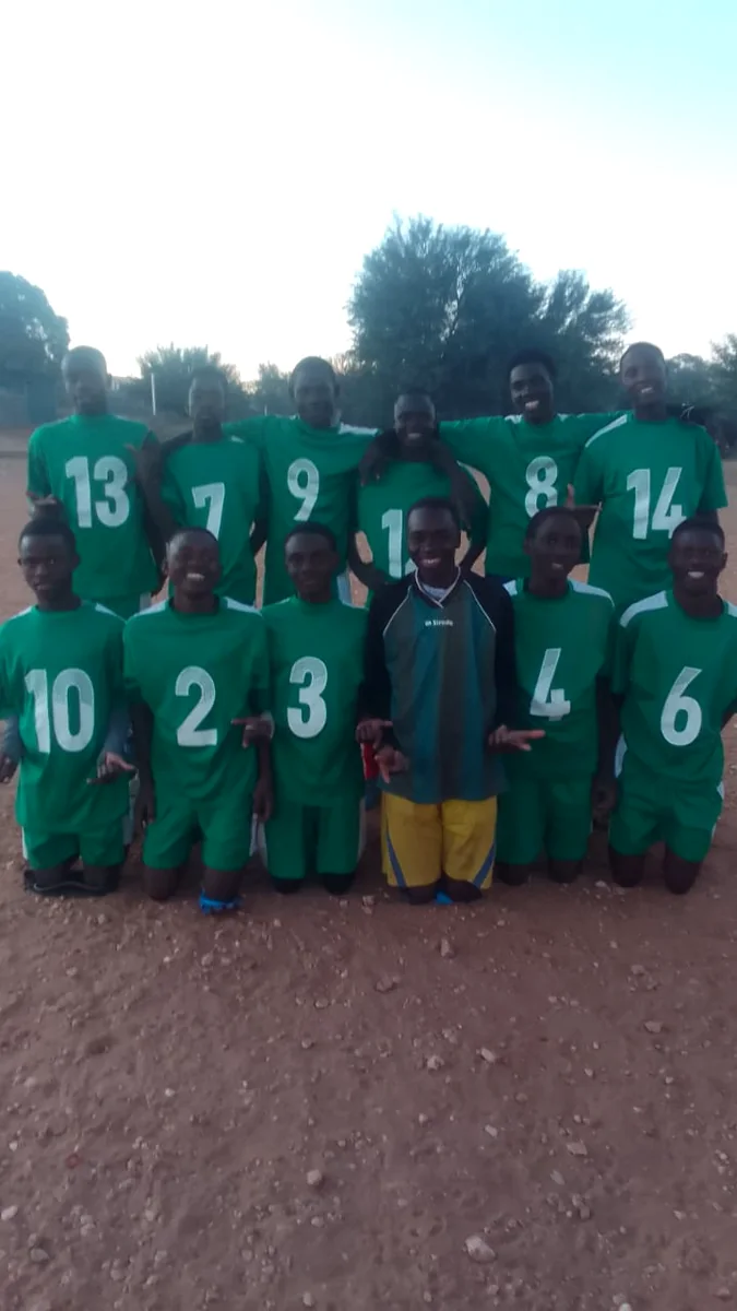 Young Magic Boys FC players in their green kit
